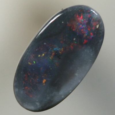 SOLID BLACK OPAL Sparkles of red and orange between black opal